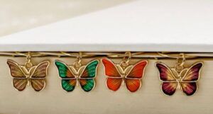 Image of four butterfly bookmark charms