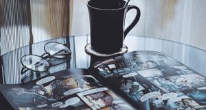 a photo of comics with a mug