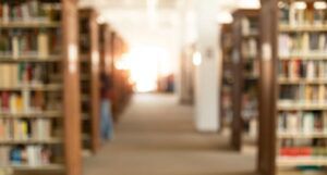 image of public library book shelves